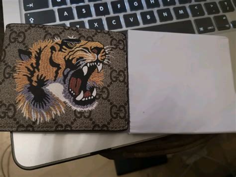 mens gucci lion wallet|genuine gucci women wallet.